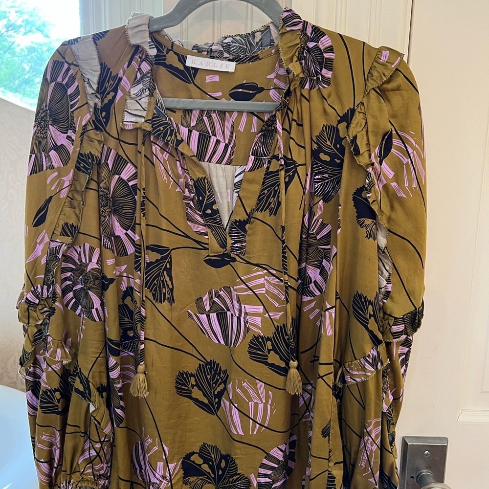 Womens long sleeve silky top with ruffle detail